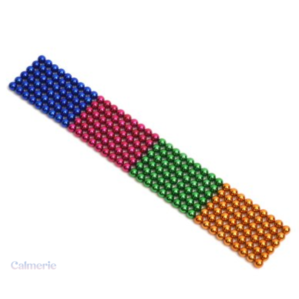Billes métalliques aimantées pour la concentration