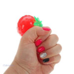 Balle anti-stress fruitée, design fraise, idéale pour la détente