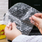 Objet anti-stress : distributeur de papier à bulle