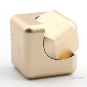 Accessoire de relaxation : Fidget Cube doré pour les mains