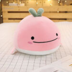 Jolie peluche baleine Kawaii, idéale pour un moment de relaxation