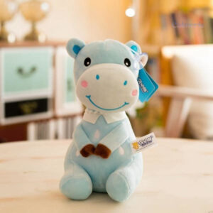 Vache en peluche confortable, parfaite pour câlins et apaisement