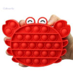Jouet Pop It en forme de crabe, parfait pour stimuler les sens