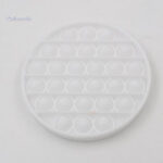 Dispositif sensoriel Pop it rond en forme de cercle
