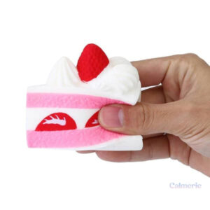 Jouet squishy en forme de part de gâteau colorée