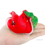 Accessoire squishy coloré en forme de pastèque, amusant et visuel
