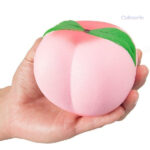 Jouet squishy en forme de pêche, idéal pour se détendre